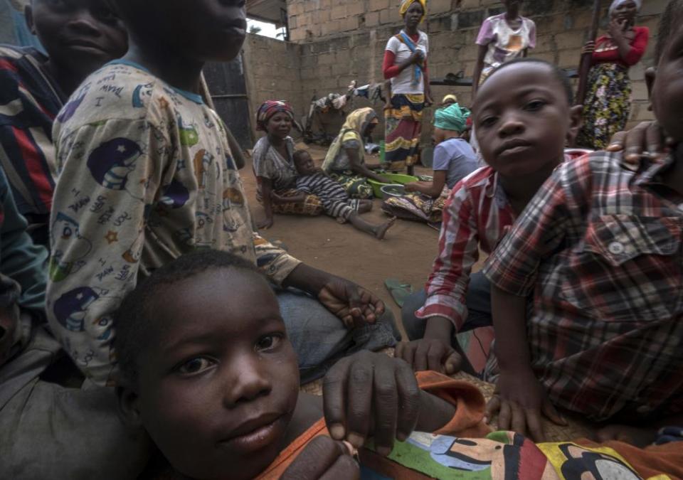 Displaced women with their children shelter in Pemba after fleeing attacks in Palma.