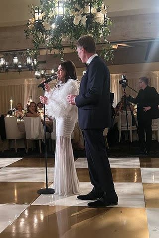 <p>Molly Mesnick/Instagram</p> Gerry Turner and Theresa Nist in her wedding reception dress.