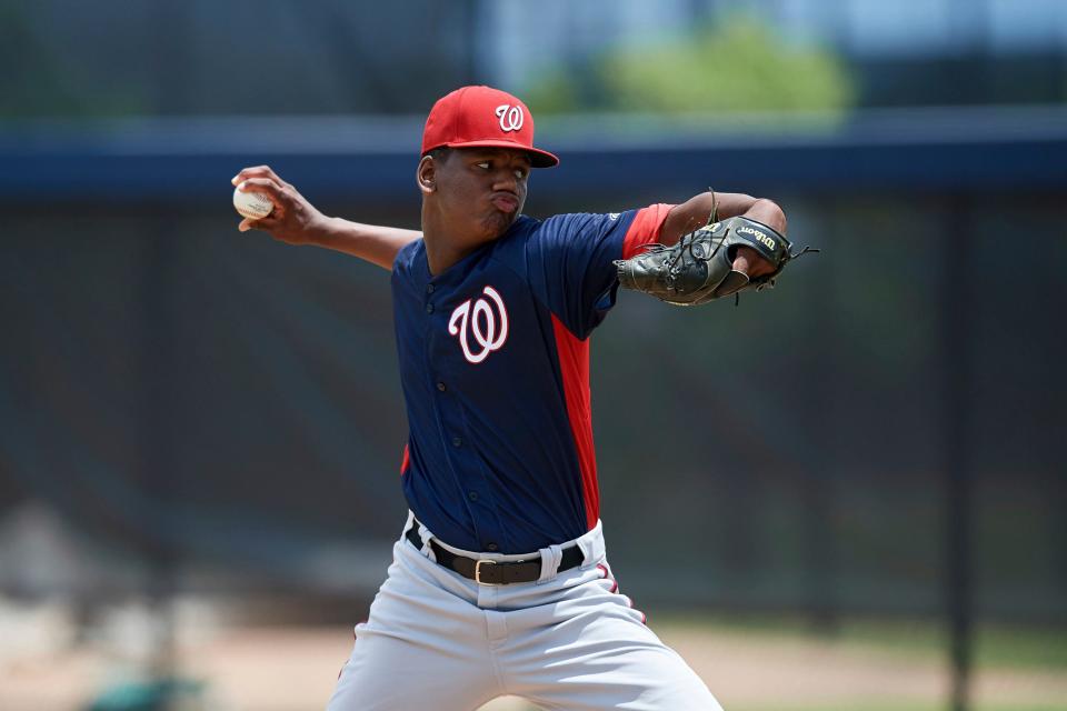 Relief pitcher Elvis Alvarado, shown during his time with the Washington Nationals organization, delivers a pitch during a Gulf Coast League game against the GCL Astros on Aug. 6, 2018 at FITTEAM Ballpark of the Palm Beaches in West Palm Beach, Florida. GCL Astros defeated GCL Nationals, 3-0.