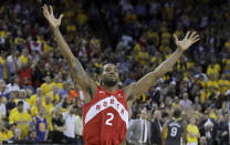 Toronto Raptors forward Kawhi Leonard celebrates after the Raptors defeated the Golden State Warriors in Game 6 of basketball's NBA Finals in Oakland, Calif., Thursday, June 13, 2019. (AP Photo/Ben Margot)