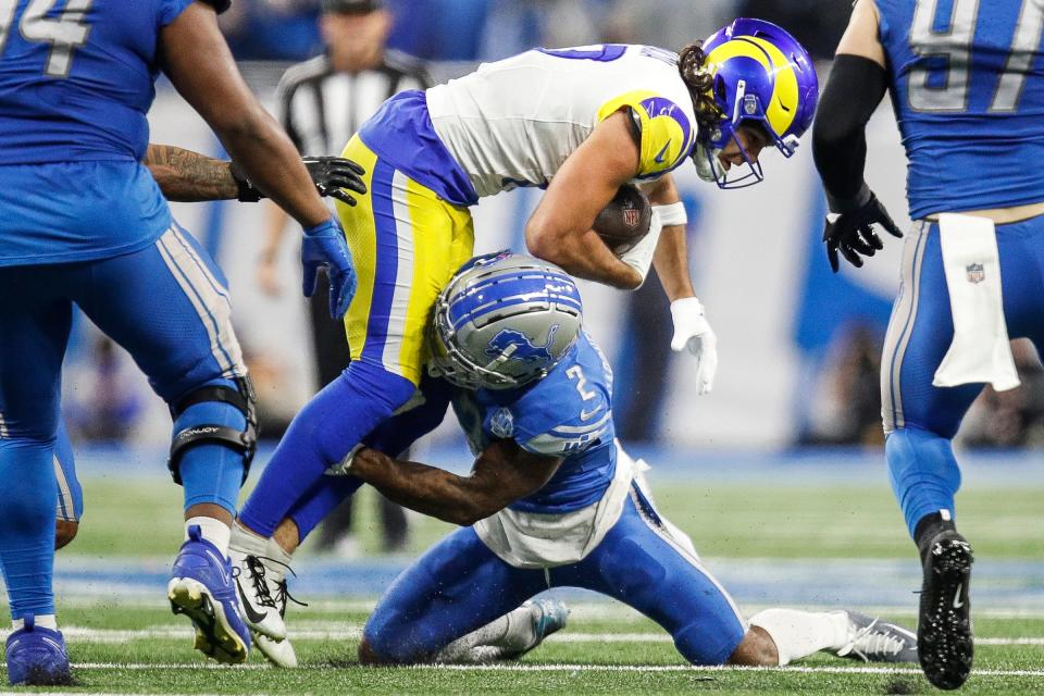 Detroit Lions safety C.J. Gardner-Johnson (2) tackles L.A. Rams wide receiver Puka Nacua (17) during the second half of the NFL wild-card playoff game at Ford Field in Detroit on Sunday, Jan, 14, 2024.