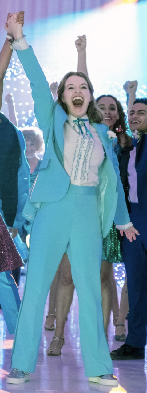 a close up of emma's pant suit