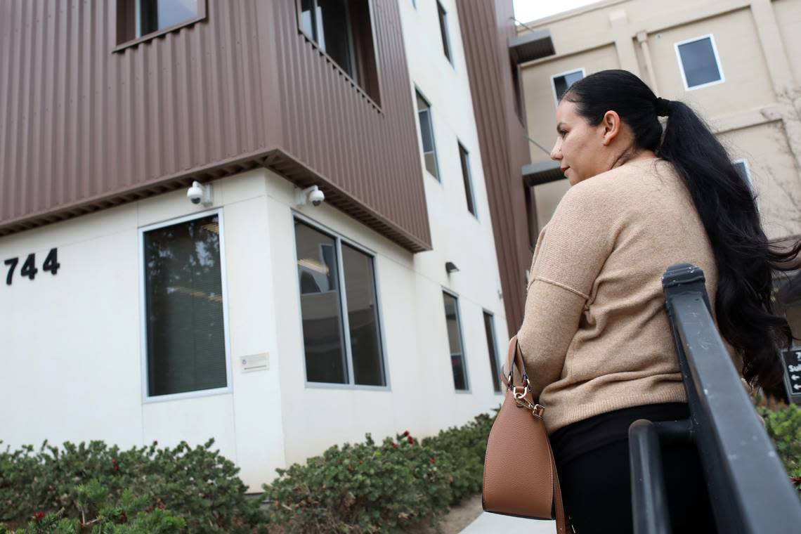 María Barragán waited outside the U.S. Citizenship and Immigration Services Fresno field office while her husband Jesús Barragán was being sworn-in in an indoor naturalization ceremony on Dec. 20, 2023.