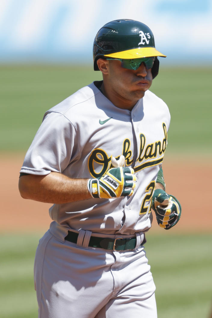 Oakland Athletics' Ramón Laureano rounds the bases after hitting a solo home run against the Cleveland Guardians during the first inning of a baseball game, Sunday, June 12, 2022, in Cleveland. (AP Photo/Ron Schwane)