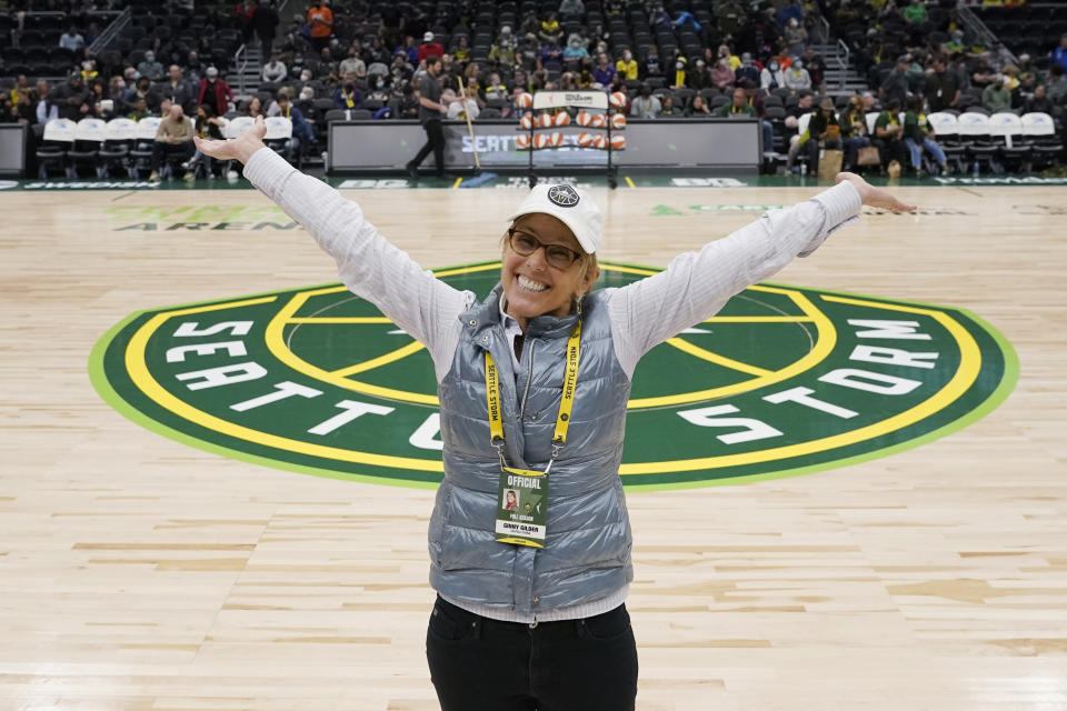 Seattle Storm co-owner Ginny Gilder poses for a photo on May 18, 2022 at Climate Pledge Arena during halftime of a WNBA basketball game between the Seattle storm and the Chicago Sky in Seattle. As Title IX marks its 50th anniversary in 2022, Gilder is one of countless women who benefited from the enactment and execution of the law and translated those opportunities into becoming leaders in their professional careers. (AP Photo/Ted S. Warren)