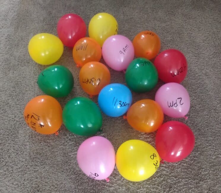 ballons on the ground as part of a balloon pop schedule