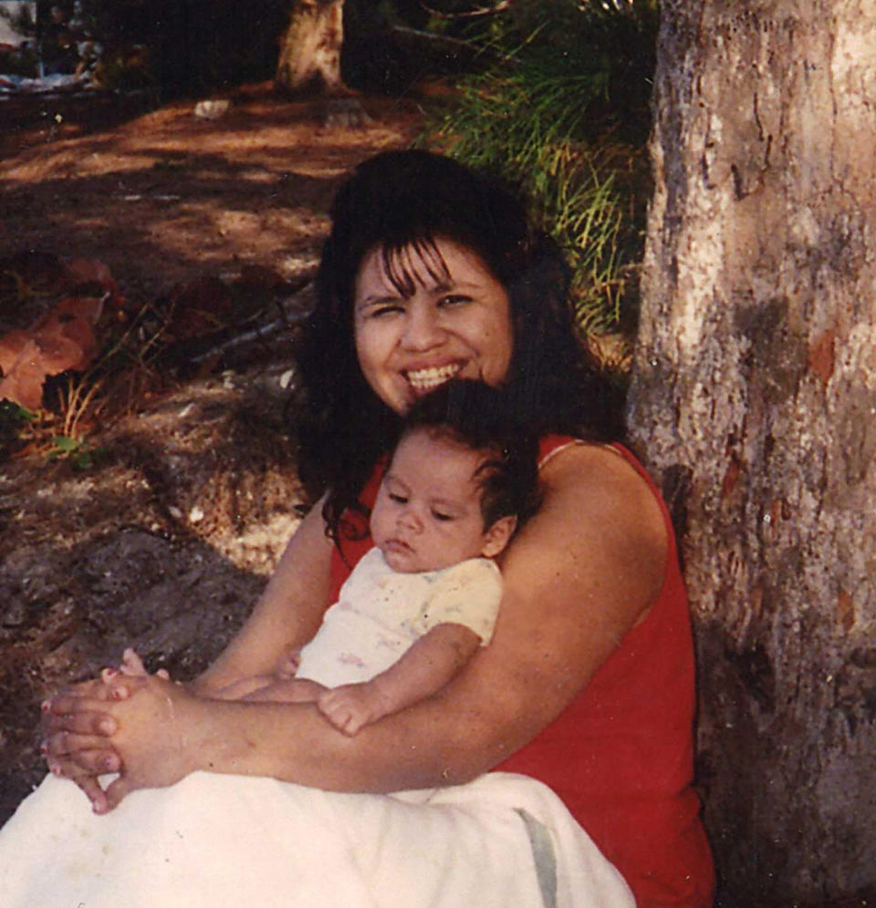 In this undated photograph, Texas death row inmate Melissa Lucio is holding one of her sons, John. Lucio is set to be executed on April 27 for the 2007 death of her 2-year-old daughter Mariah. Prosecutors say Lucio fatally beat Mariah but Lucio has long denied that, saying her daughter died from injuries sustained during a fall down a flight of stairs. Her lawyers say Lucio's history of sexual and physical abuse led to her giving an unreliable confession. They hope to persuade the state's Board of Pardons and Paroles and Gov. Greg Abbott to either grant an execution reprieve or commute her sentence. (Photo courtesy of the family of Melissa Lucio via AP)