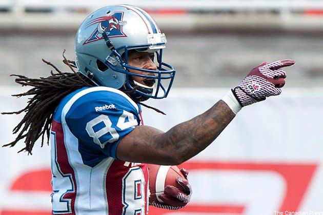 CFL players adjust to protective helmet caps