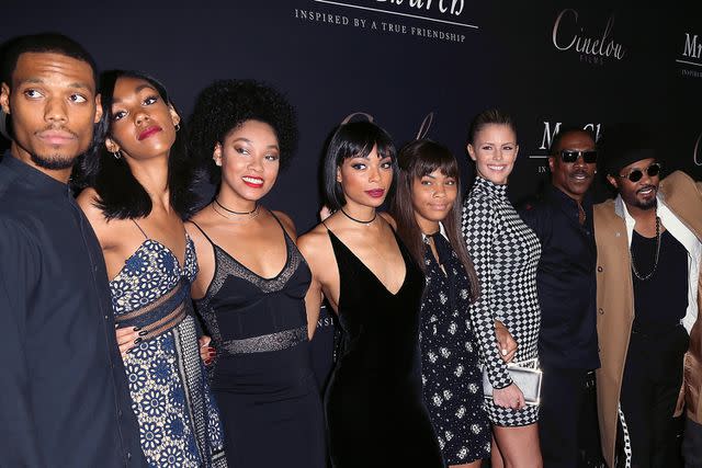 <p>David Livingston/Getty</p> Eddie Murphy with his kids at the premiere of "Mr. Church" in September 2016.