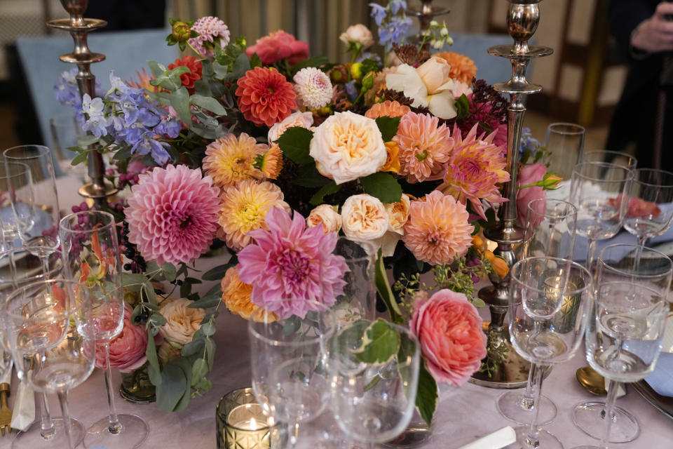 Flowers are set as the centerpieces on a table for the State Dinner on Wednesday with Australia's Prime Minister Anthony Albanese is seen in the State Dining Room during a media preview Tuesday, Oct. 24, 2023, at the White House in Washington. (AP Photo/Mark Schiefelbein)