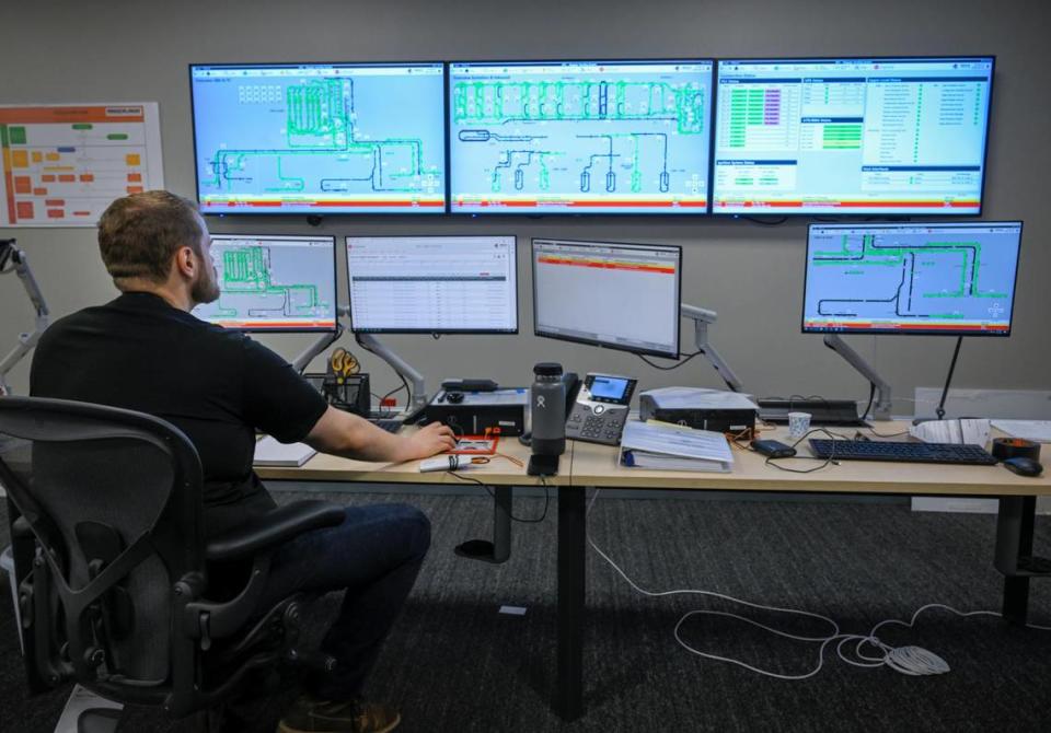 Controller Cooper Harris monitors the baggage handling system and conveyor lines at Kansas City International Airport. “Car seats are the number one reason the line jams,” said Harris. The control room is part of the new $54 million baggage handling system at Kansas City International Airport.