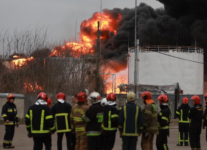 Firefighters at the site of a fire at an industrial facility in Lviv (Getty)