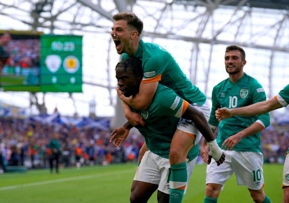 Michael Obafemi (left) celebrates after scoring the Republic of Ireland’s third goal against Scotland in June (Niall Carson/PA) (PA Wire)