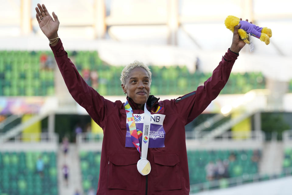 Gold medalist Yulimar Rojas, of Venezuela, celebrates during a medal ceremony for triple jump women at the World Athletics Championships on Monday, July 18, 2022, in Eugene, Ore. (AP Photo/Gregory Bull)