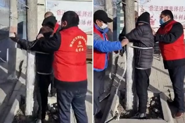 Community volunteers tie elderly man to tree after he breaks Covid-19 lockdown rules in northern China