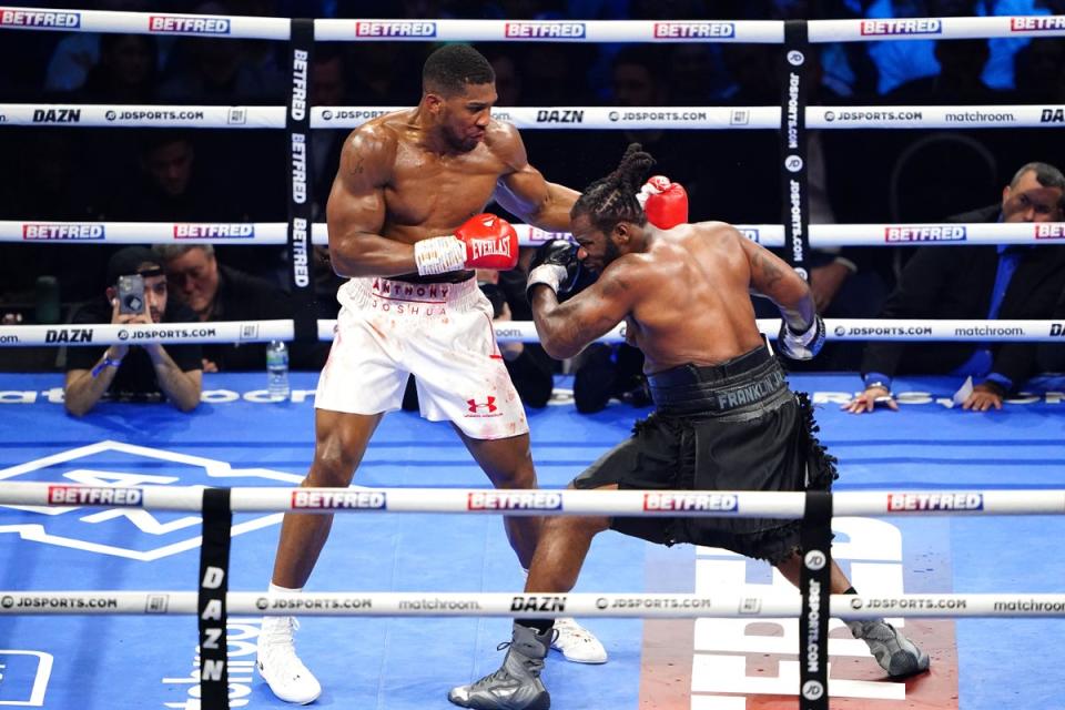 Anthony Joshua (left) laboured to victory over Jermaine Franklin (Zac Goodwin/PA). (PA Wire)
