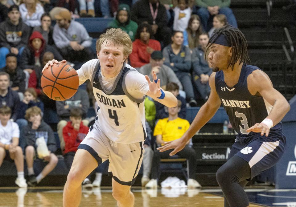 Manasquan's Ryan Frauenheim drives against Ranney's Isaac Hester during the Shore Conference Tournament final on Feb. 19, 2023.