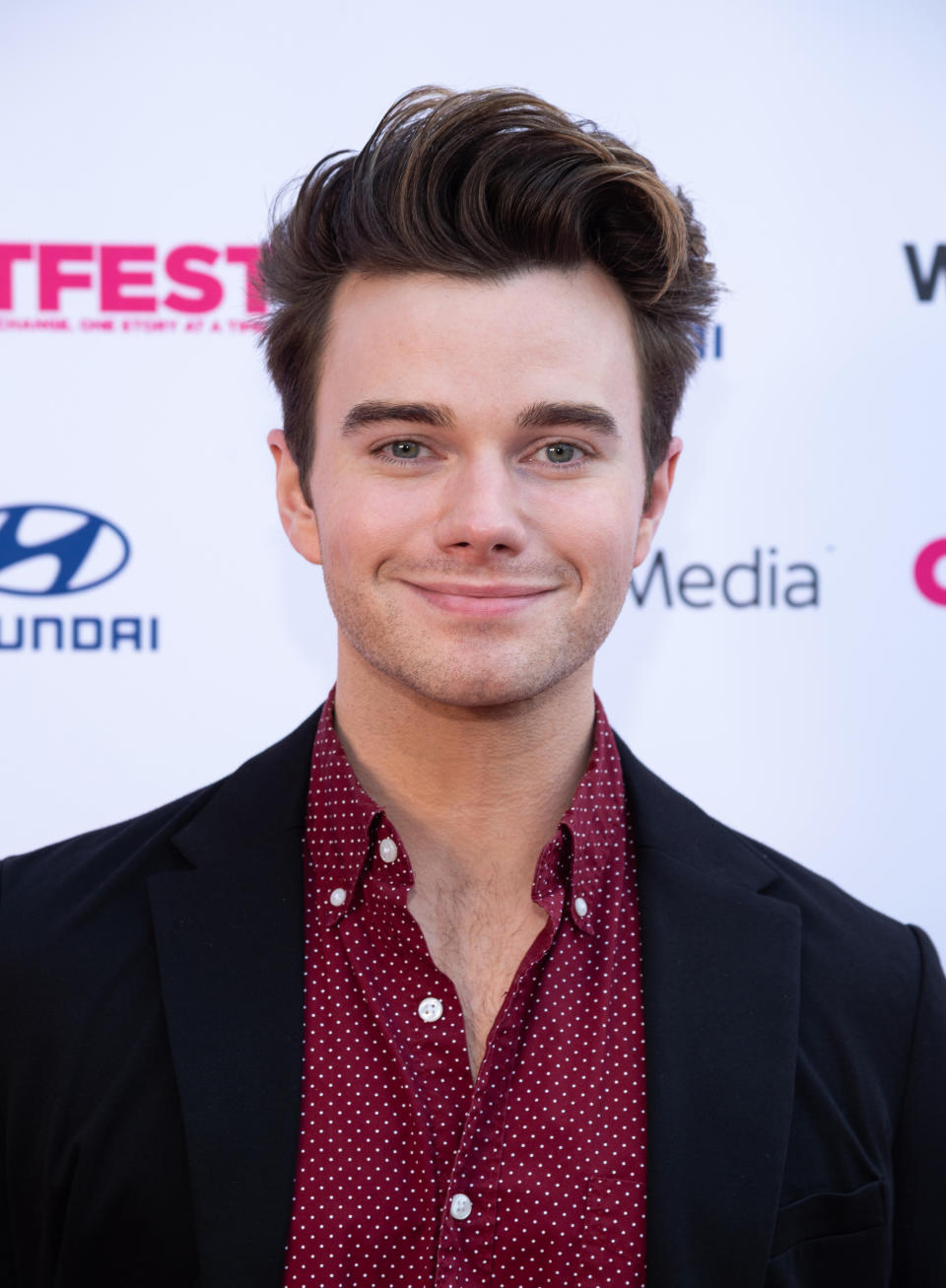 Chris Colfer smiles at the Outfest Los Angeles LGBTQ Film Festival premiere of "The Sixth Reel" in August 2021