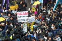 Pro-democracy activists protest against the election of the new Hong Kong chief executive by a mainly pro-China committee