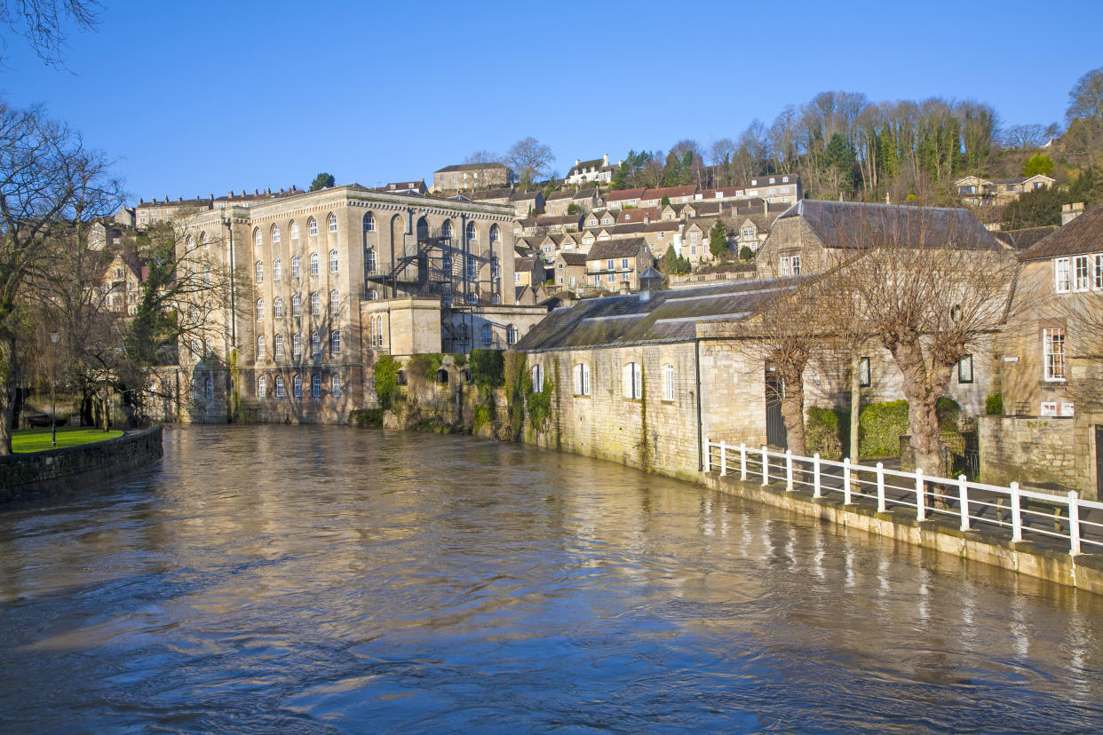 Historic buildings and River Avon, Bradford on Avon, Wiltshire, England (Photo by: Education Images/Universal Images Group via Getty Images)