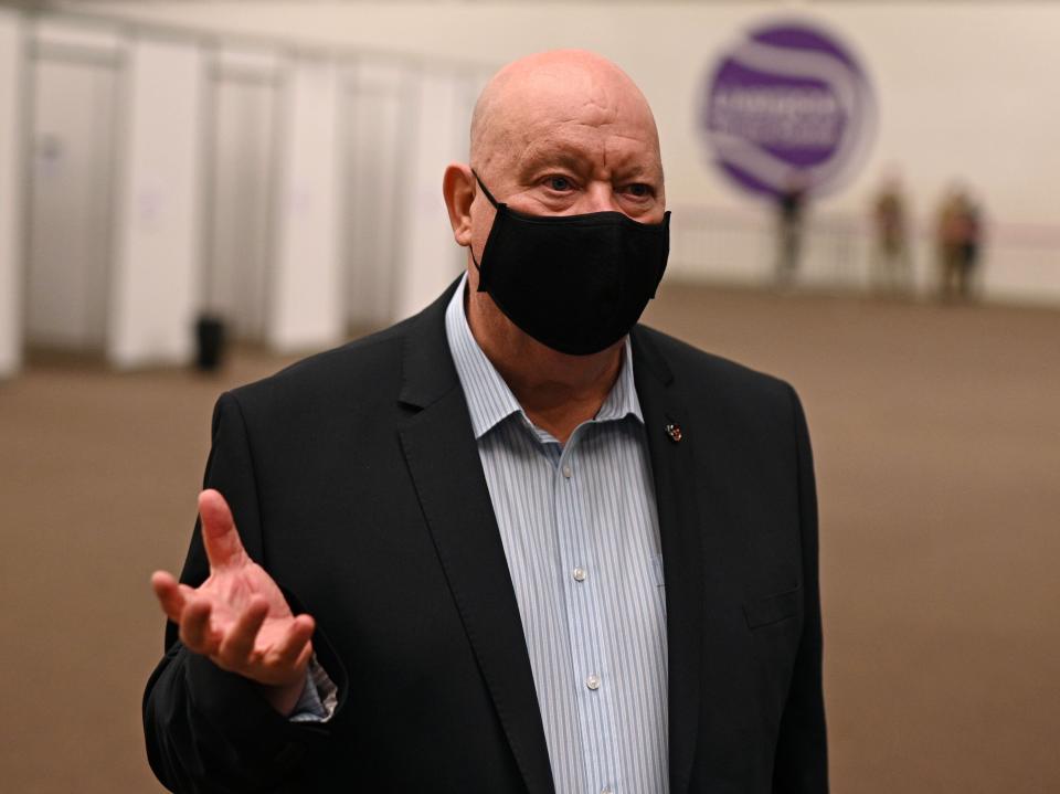Mayor of Liverpool Joe Anderson talks to journalists inside a Covid-19 rapid testing centre in NovemberAFP via Getty Images