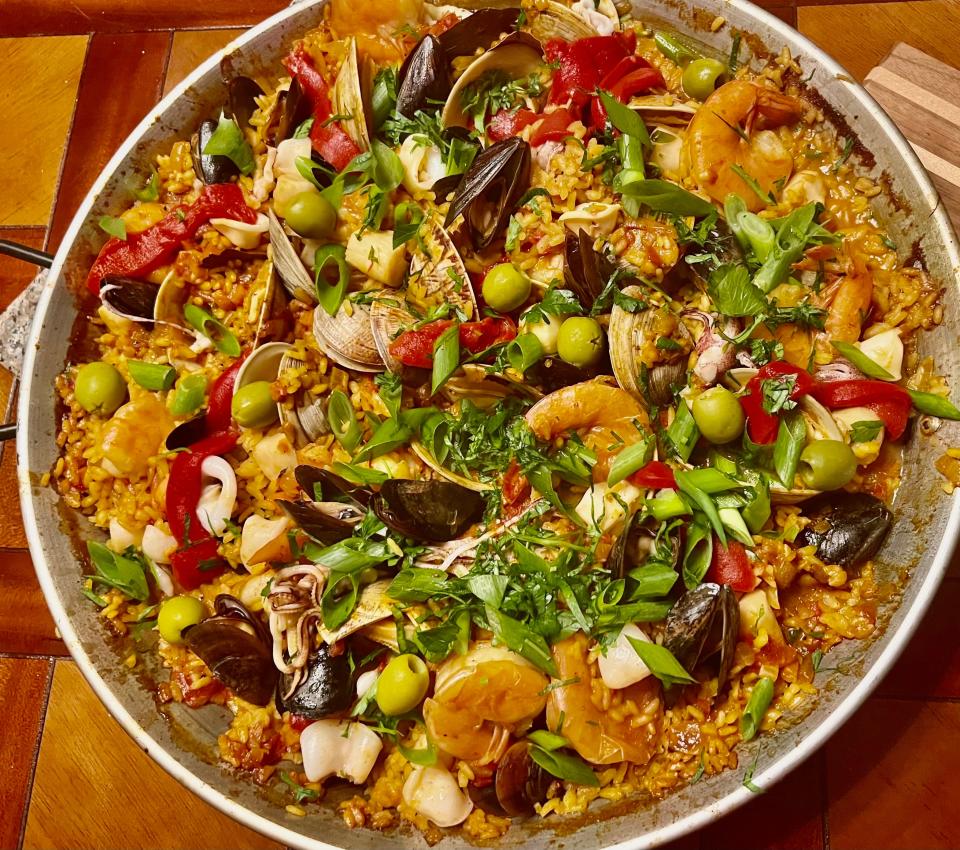 Seafood paella with chorizo sausage, jumbo shrimp, sea scallops, little neck clams, mussels, calamari seasoned with Spanish olives and red pepper and simmered in saffron Bomba rice as prepared by Chef Charles Hermann, the owner of a new restaurant at the Taunton Airport set to open in March 2024.