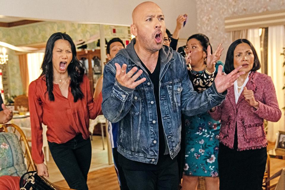 (from left) Tito Manny (Joey Guila), Regina (Elena Juatco), Eugene (Eugene Cordero), Joe Valencia (Jo Koy), Tita Teresa (Tia Carrere), Tita Yvonne (Melody Butiu) and Susan (Lydia Gaston) in Easter Sunday, directed by Jay Chandrasekhar.