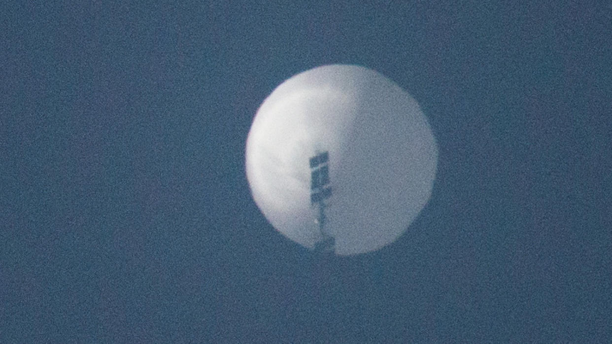 A balloon flies in the sky over Billings, Mont.