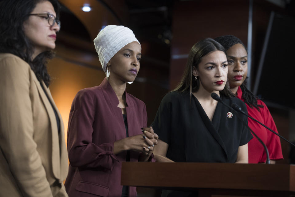 UNITED STATES - JULY 15: From left, Reps. Rashida Tlaib, D-Mich., Ilhan Omar, D-Minn., Alexandria Ocasio-Cortez, D-N.Y., and Ayanna Pressley, D-Mass., conduct a news conference in the Capitol Visitor Center responding to negative comments by President Trump that were directed at the freshman House Democrats on Monday, July 15, 2019. (Photo By Tom Williams/CQ Roll Call)