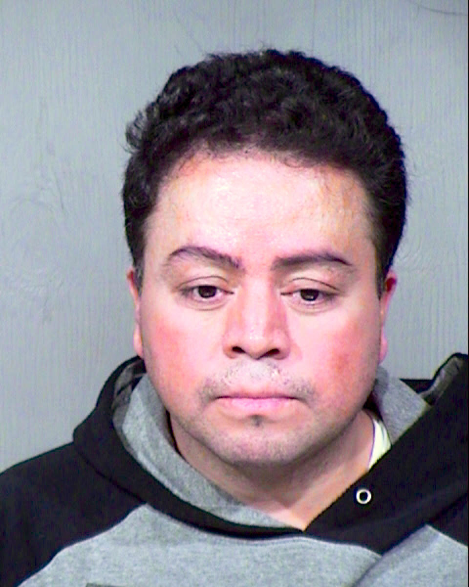 This Thursday, Jan. 30, 2020 jail booking photo released by the Maricopa County Sheriff's Office shows Adan Perez Huerta, 32, who was arrested in Toronto and returned to Arizona where he was booked into jail in Phoenix. Huerta, who pleaded guilty in 2003 to murder before fleeing Arizona to avoid being sentenced, has been arrested in Canada 16 years later after police followed digital footprints provided by social media posts of his family and friends, authorities said. (Maricopa County Sheriff's Office via AP)