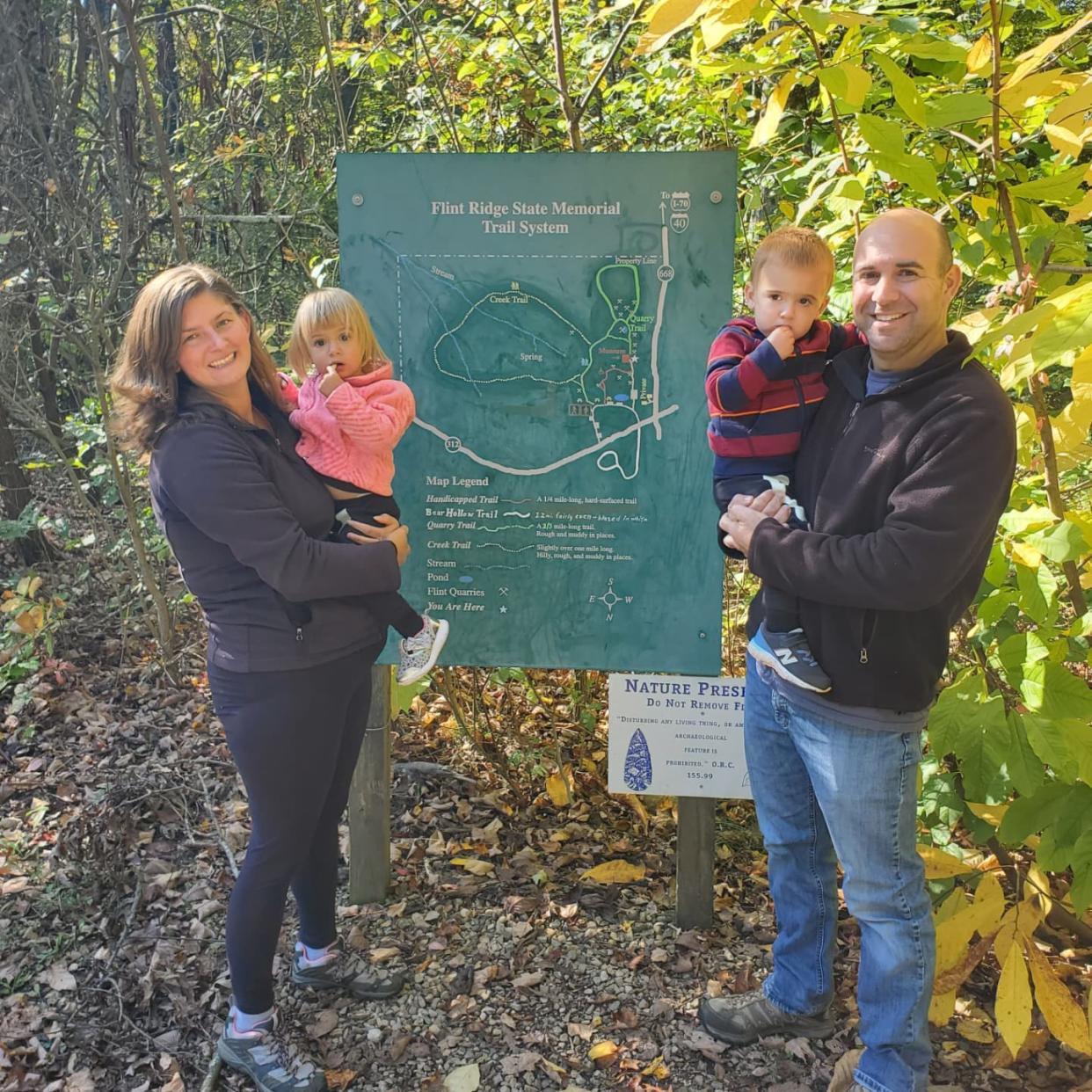 Roxanne and Christopher Sams, along with their twins Amelia and Alexander, take a picture at Flint Ridge Memorial Trail. Roxanne started a YouTube channel in December to teach about Ohio history.