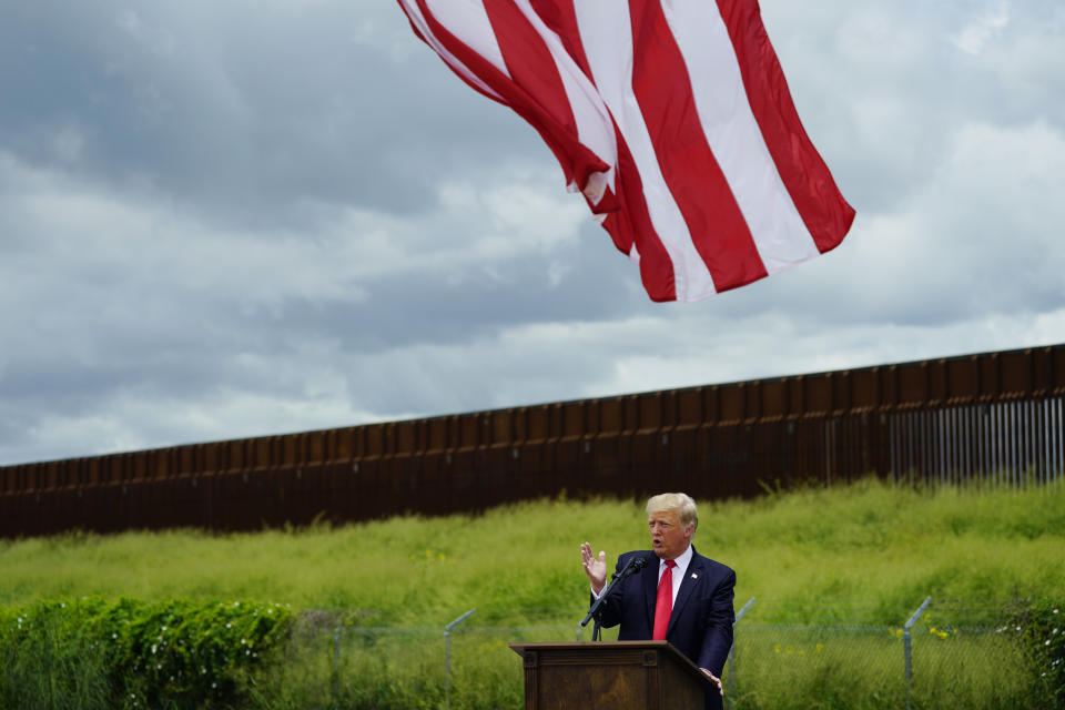 Former President Donald Trump speaks during a visit to an unfinished section of border wall with Texas Gov. Greg Abbott, in Pharr, Texas, Wednesday, June 30, 2021. (AP Photo/Eric Gay)