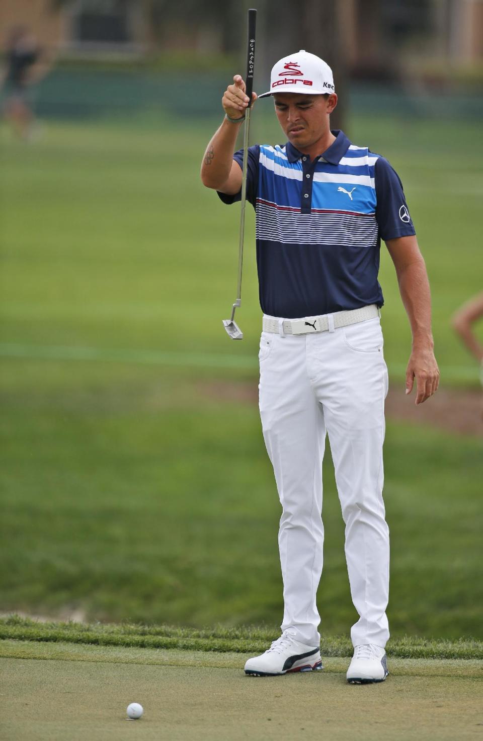 Rickie Fowler lines up a putt on the second hole during the third round of the Honda Classic golf tournament, Saturday, Feb. 25, 2017, in Palm Beach Gardens, Fla. (AP Photo/Wilfredo Lee)