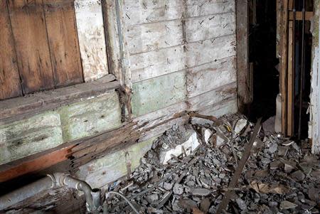 Debris is pictured inside the home of Christine Cina after Superstorm Sandy in the Staten Island borough of New York, September 20, 2013. REUTERS/Carlo Allegri