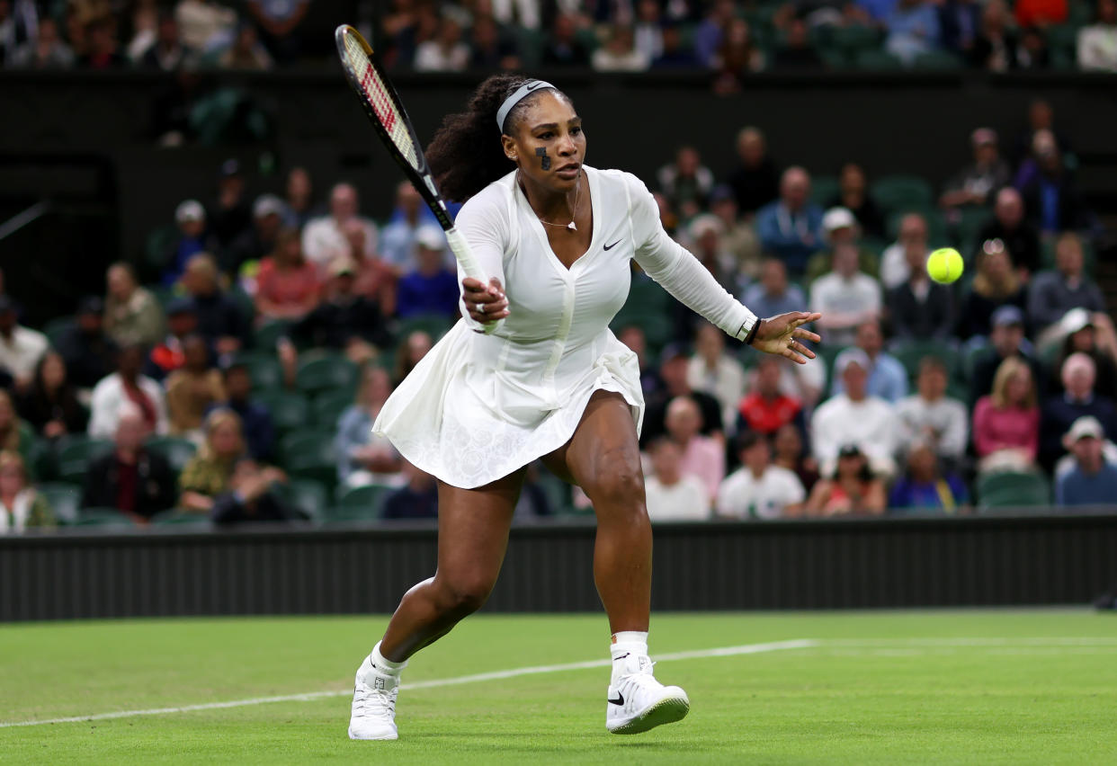LONDON, ENGLAND - JUNE 28: Serena Williams of United States plays a forehand against Harmony Tan of France during their Women's Singles First Round Match on day two of The Championships Wimbledon 2022 at All England Lawn Tennis and Croquet Club on June 28, 2022 in London, England. (Photo by Clive Brunskill/Getty Images)