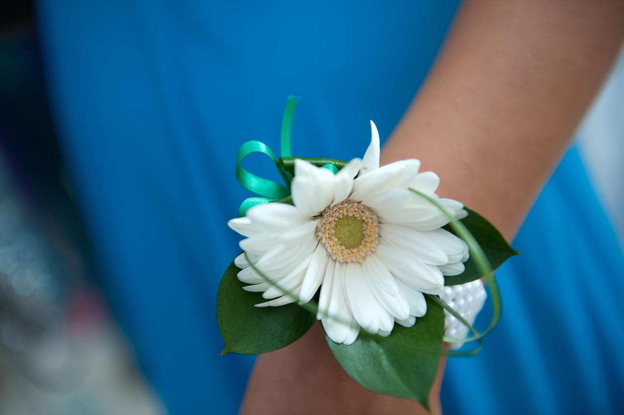 Students on their way to prom were treated to dinner by an anonymous gentleman who said that their group of 11 friends reminded him of his younger days. (Photo by Bethany Clarke/Getty Images)