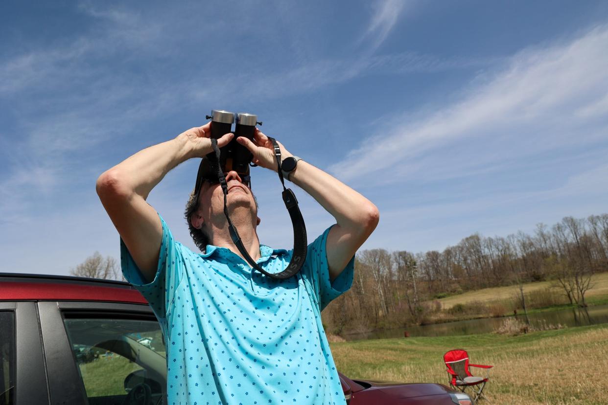 Matt Bernstein, 66, an astronomy enthusiast and retired medical physicist from Minnesota, rerouted plans to view the eclipse in Texas for sunny skies in a rural area near Spencer, Indiana.