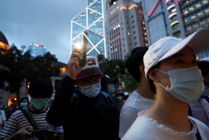 Chinese words "Hong Kong" is seen on a mobile phone case during a protest to mark the first anniversary of a mass rally against the now-withdrawn extradition bill, in Hong Kong