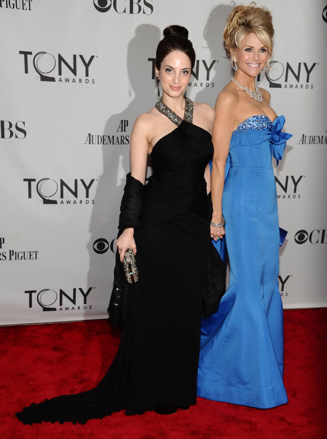 Christie Brinkley, left, and her daughter Alexa Ray Joel arrive at the 65th annual Tony Awards, in New York in 2011. In 2017 Brinkley returned to the pages of the Sports Illustrated Swimsuit issue at age 63. She appeared with her two daughters, Joel and Sailor Brinkley Cook. Charles Sykes/AP file