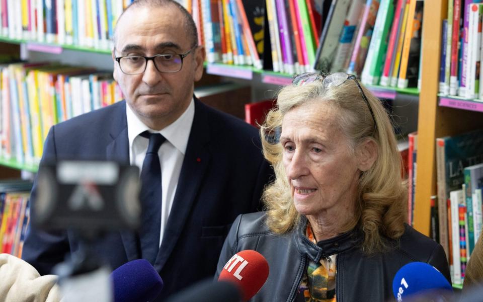 Nicole Belloubet, the French education minister, and Laurent Nuñez, the prefect of Police in Paris, speak to media at Maurice Ravel school