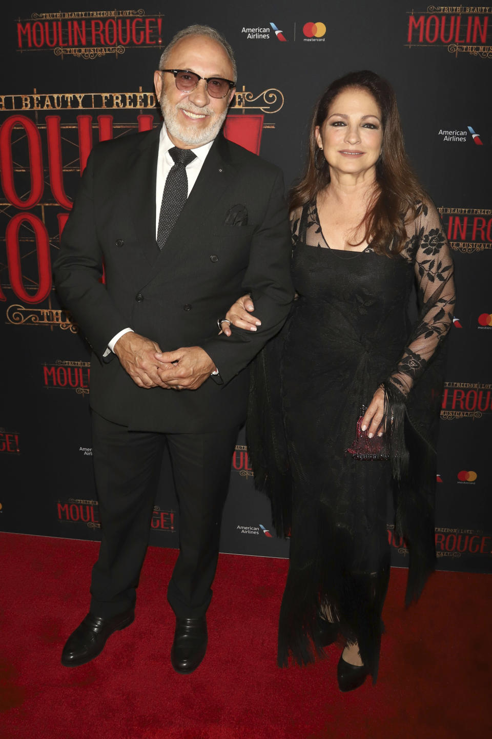 FILE - Emilio Estefan, left, and Gloria Estefan attend the Broadway opening of "Moulin Rouge! The Musical" in New York on July 25, 2019. The couple's restaurant Estefan Kitchen served up homemade meals for health care workers in Miami. (Photo by Greg Allen/Invision/AP, File)
