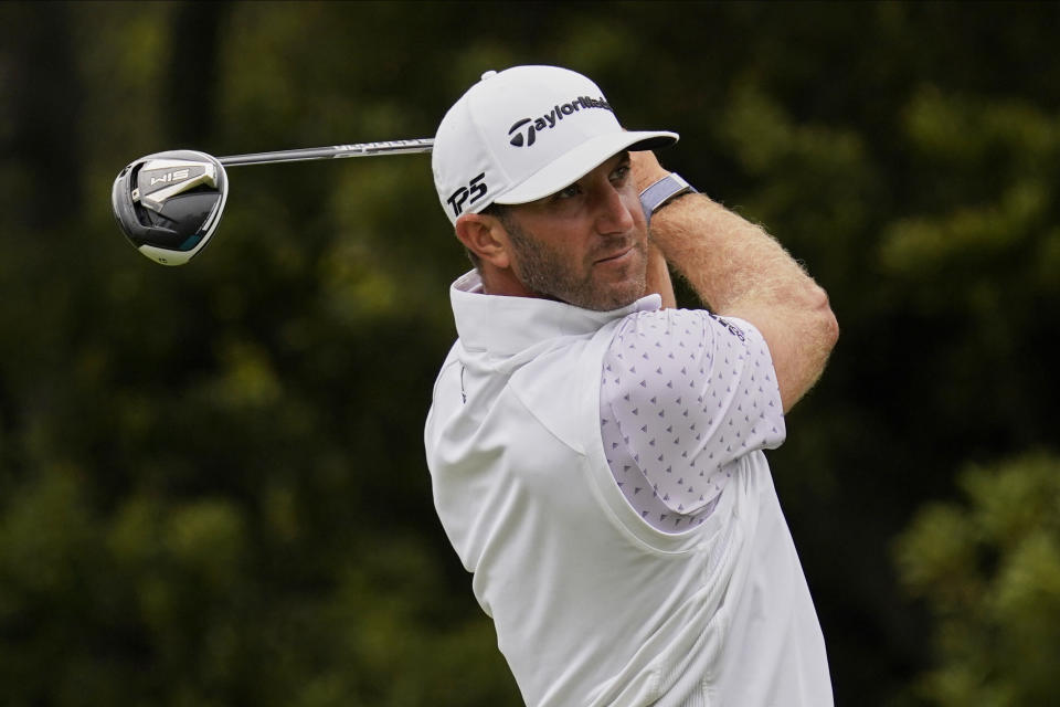 Dustin Johnson watches his tee shot on the 12th hole during the third round of the PGA Championship golf tournament at TPC Harding Park Saturday, Aug. 8, 2020, in San Francisco. (AP Photo/Jeff Chiu)