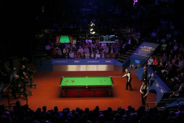 John Higgins at the table during the World Championship at the Crucible in Sheffield.