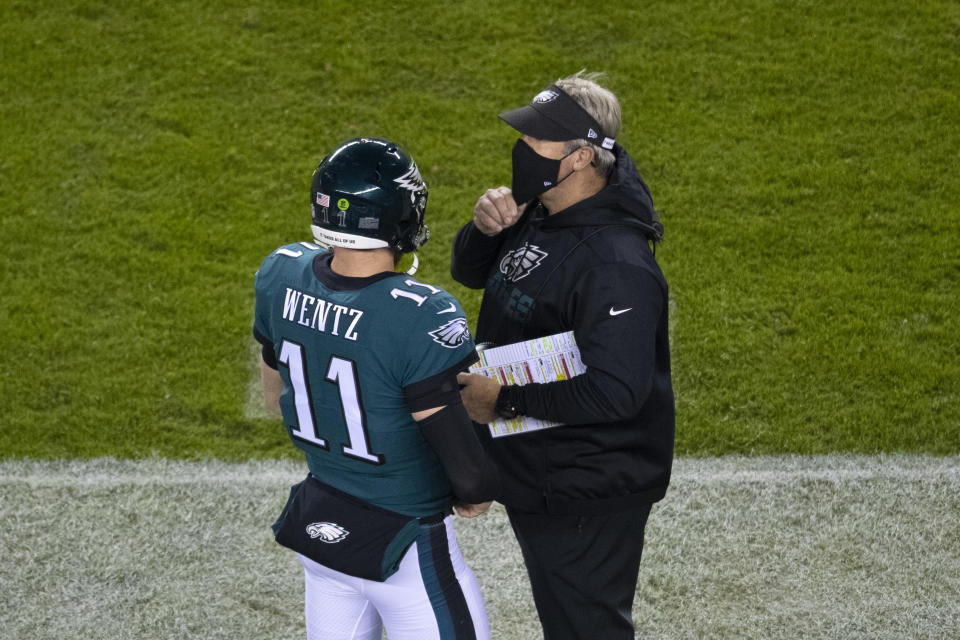 Doug Pederson said he hasn't decided yet if Carson Wentz or Jalen Hurts will start in Week 14. (Photo by Mitchell Leff/Getty Images)