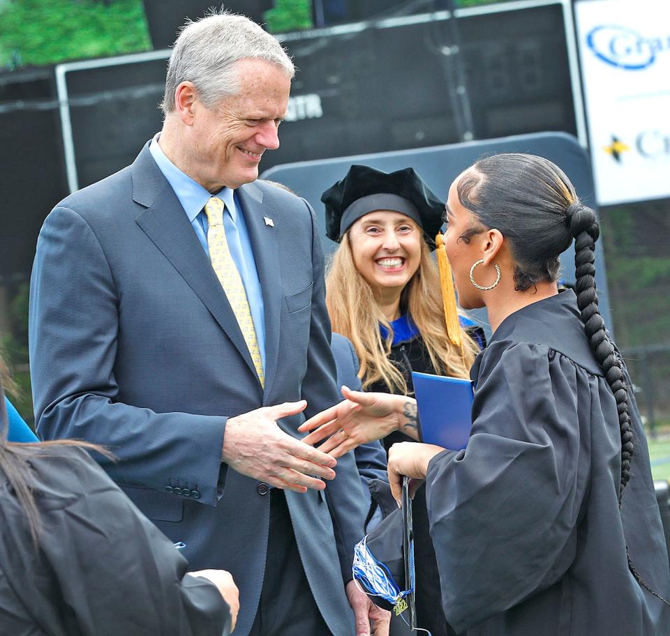 Gov. Charlie Baker shakes the hand of every graduate at the Quincy College graduation ceremony in Quincy on Friday, May 20, 2022.