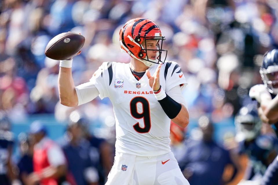 Cincinnati Bengals quarterback <a class="link " href="https://sports.yahoo.com/nfl/players/32671" data-i13n="sec:content-canvas;subsec:anchor_text;elm:context_link" data-ylk="slk:Joe Burrow;sec:content-canvas;subsec:anchor_text;elm:context_link;itc:0">Joe Burrow</a> (9) looks to pass against the <a class="link " href="https://sports.yahoo.com/nfl/teams/tennessee/" data-i13n="sec:content-canvas;subsec:anchor_text;elm:context_link" data-ylk="slk:Tennessee Titans;sec:content-canvas;subsec:anchor_text;elm:context_link;itc:0">Tennessee Titans</a> during the third quarter at Nissan Stadium in Nashville, Tenn., Sunday, Oct. 1, 2023.