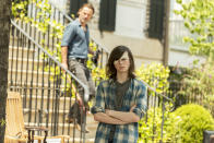 <p>Chandler Riggs as Carl Grimes, Andrew Lincoln as Rick Grimes (Credit: Gene Page/AMC) </p>