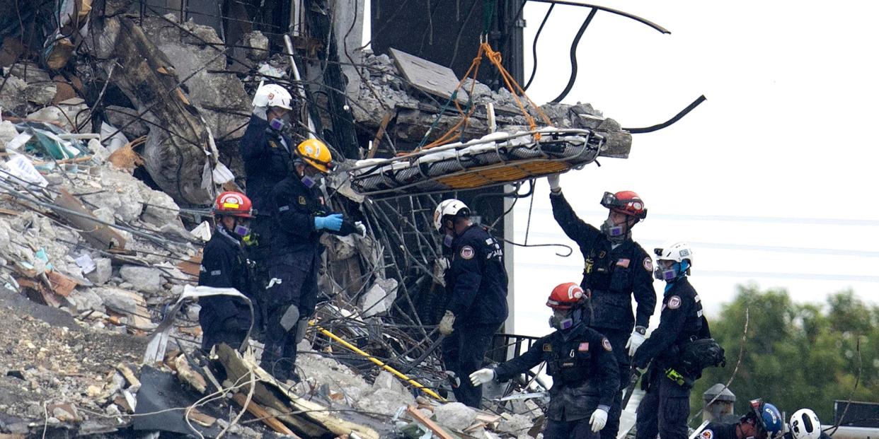 rescue workers at the scene of the collapsed Florida condo
