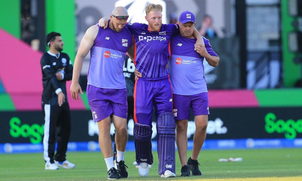 <span>Ben Stokes is helped off the field during the match between Manchester Originals and Northern Superchargers at Old Trafford.</span><span>Photograph: George Franks/ProSports//Shutterstock</span>