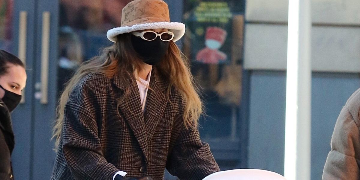 Shop Gigi Hadid's Mango Coat and Shearling LV Bucket Hat